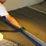 Aplikace nesamonivelačního podlahového potěru 